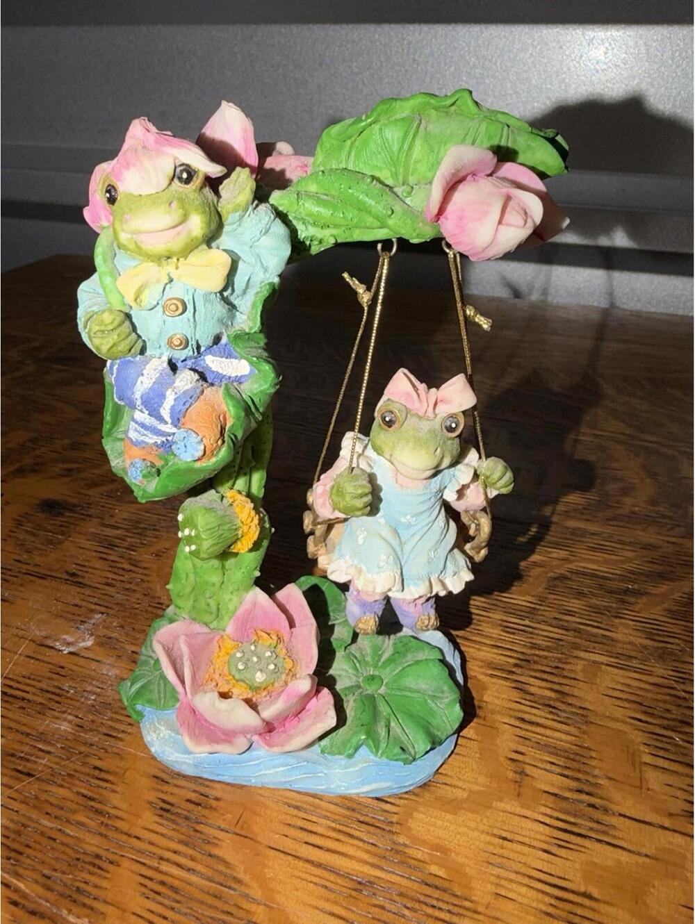 ADORABLE￼FROGS PLAYING SWINGSET FIGURINE ￼